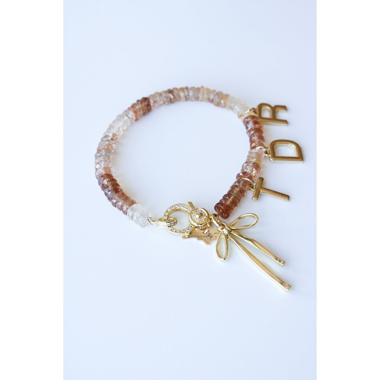 Imperial Topaz Beaded Bow Charm Bracelet