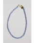 A single strand of light blue freshwater pearls with a pavé clasp and Taylor Reese branded tag.