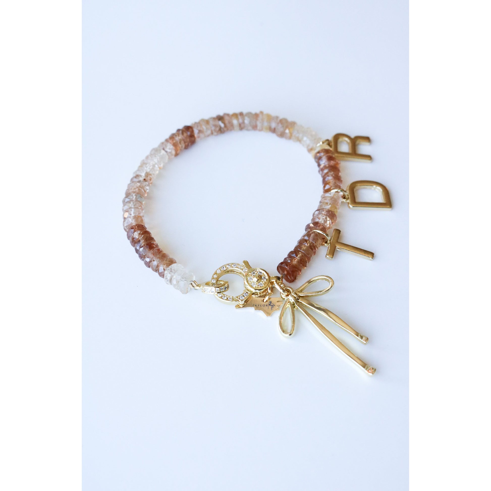 Imperial Topaz Beaded Bow Charm Bracelet