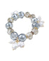 Beaded bracelet with gray, white, and gold beads on a white background