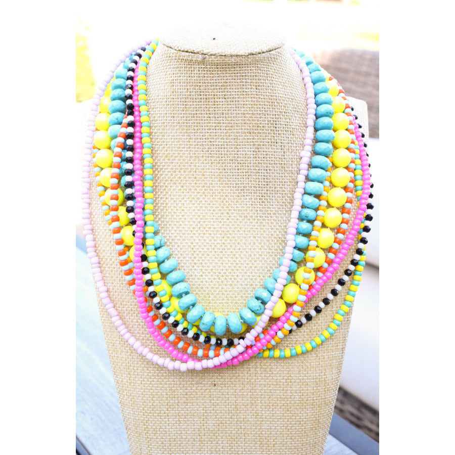 turquoise howlite knotted necklace is shown styled with other taylor reese necklaces