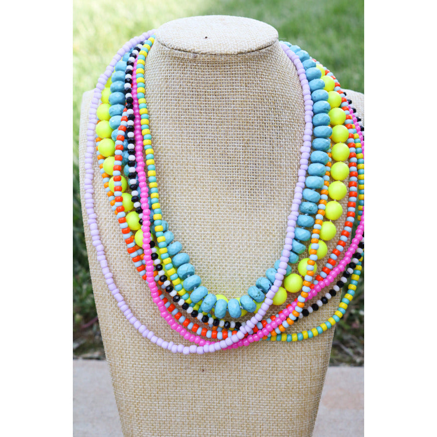 80s baby neon necklace styled with swarovski pearl neon necklace and turquoise howlite necklace