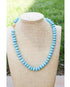 Turquoise howlite hand knotted necklace with pave gold lever clasp
