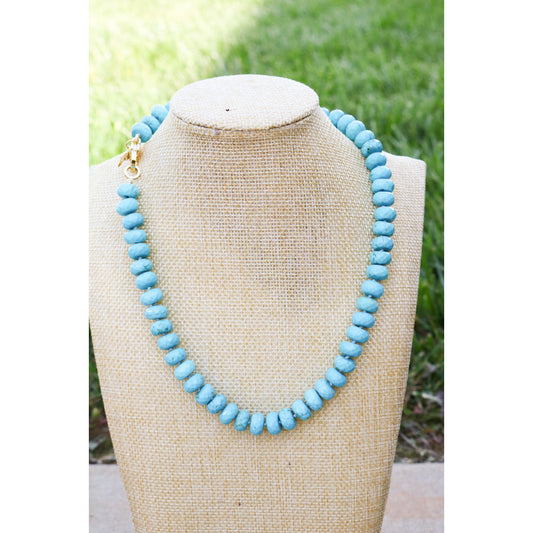 Turquoise howlite hand knotted necklace with pave gold lever clasp