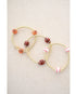 basketball theme bracelet shown with the football and baseball theme stretch bracelets