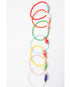An assortment of colorful bracelets in a line. The image shows a single painted ceramic fish bead on a colored glass bead bracelet.