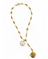 gold chain necklace with mother of pearl pendant and brass locket pendant on a white background