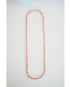 single strand crystal and coral long beaded necklace with gold-tone pavé clasp.