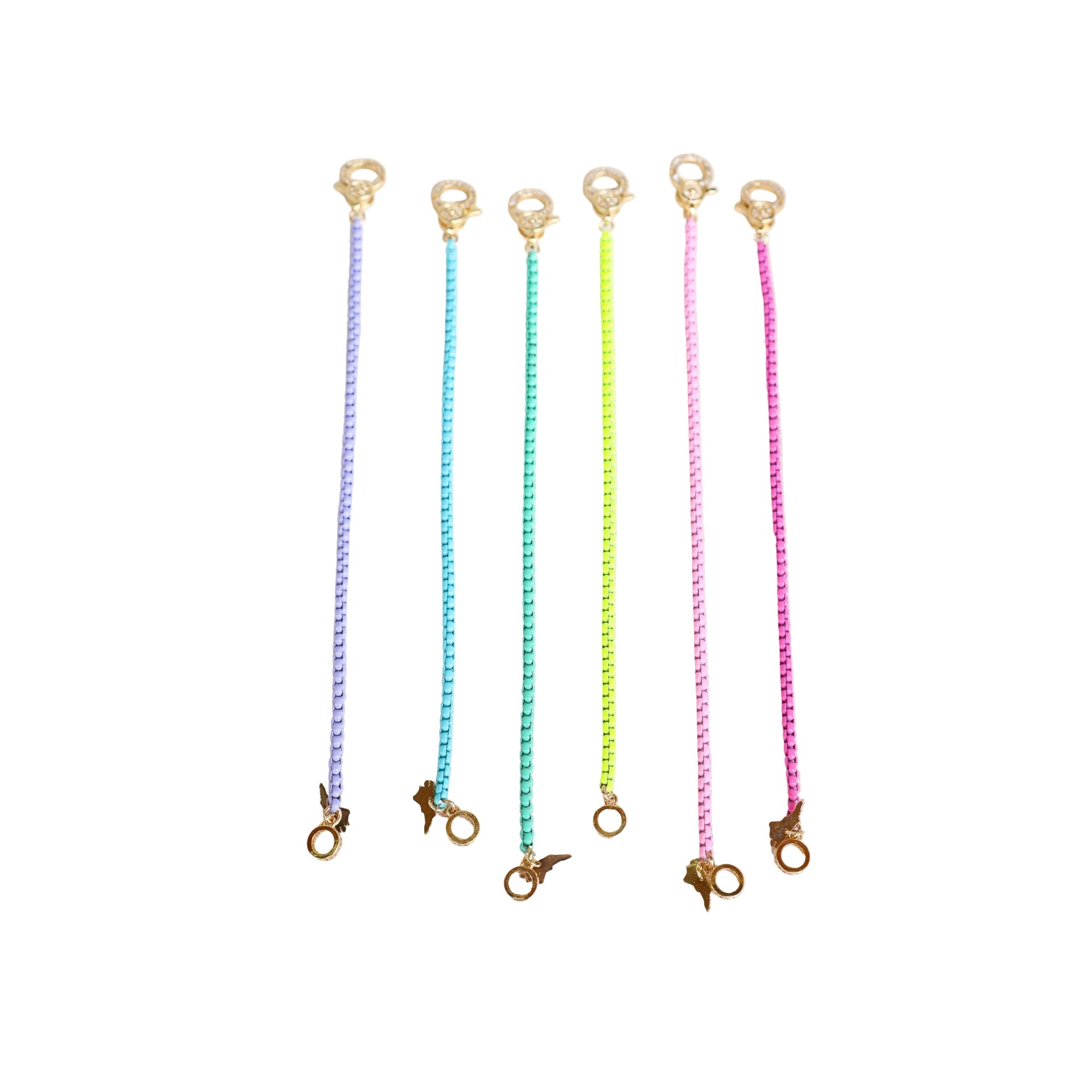 Set of five colorful chain bracelets with gold pave lever clasps on a white background