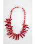 Red and black coral shaped beads collar necklace on a white background
