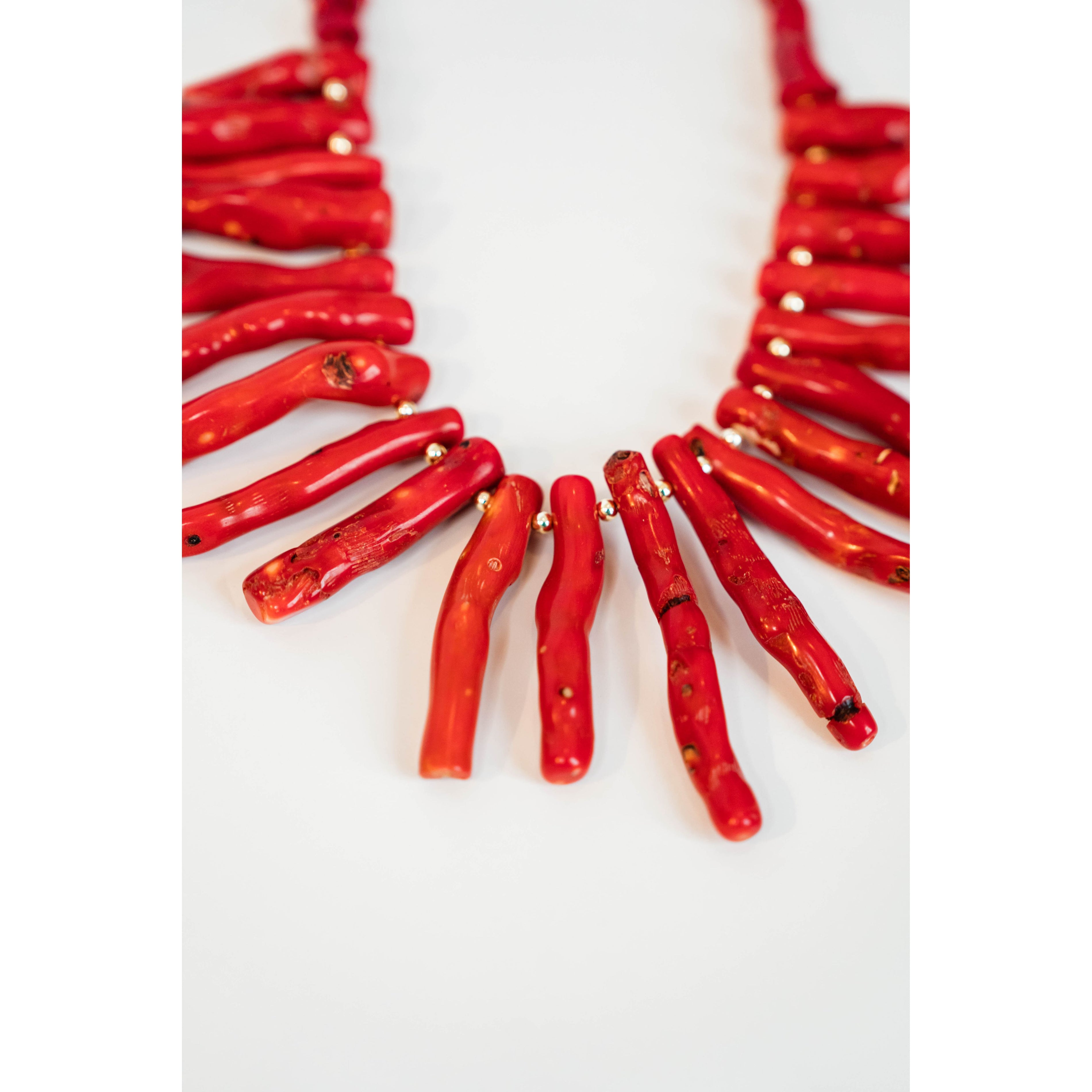 red coral collared necklace with gold round spacer beads
