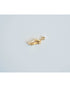 Gold shoe-shaped charm with pave detailing on a light gray background