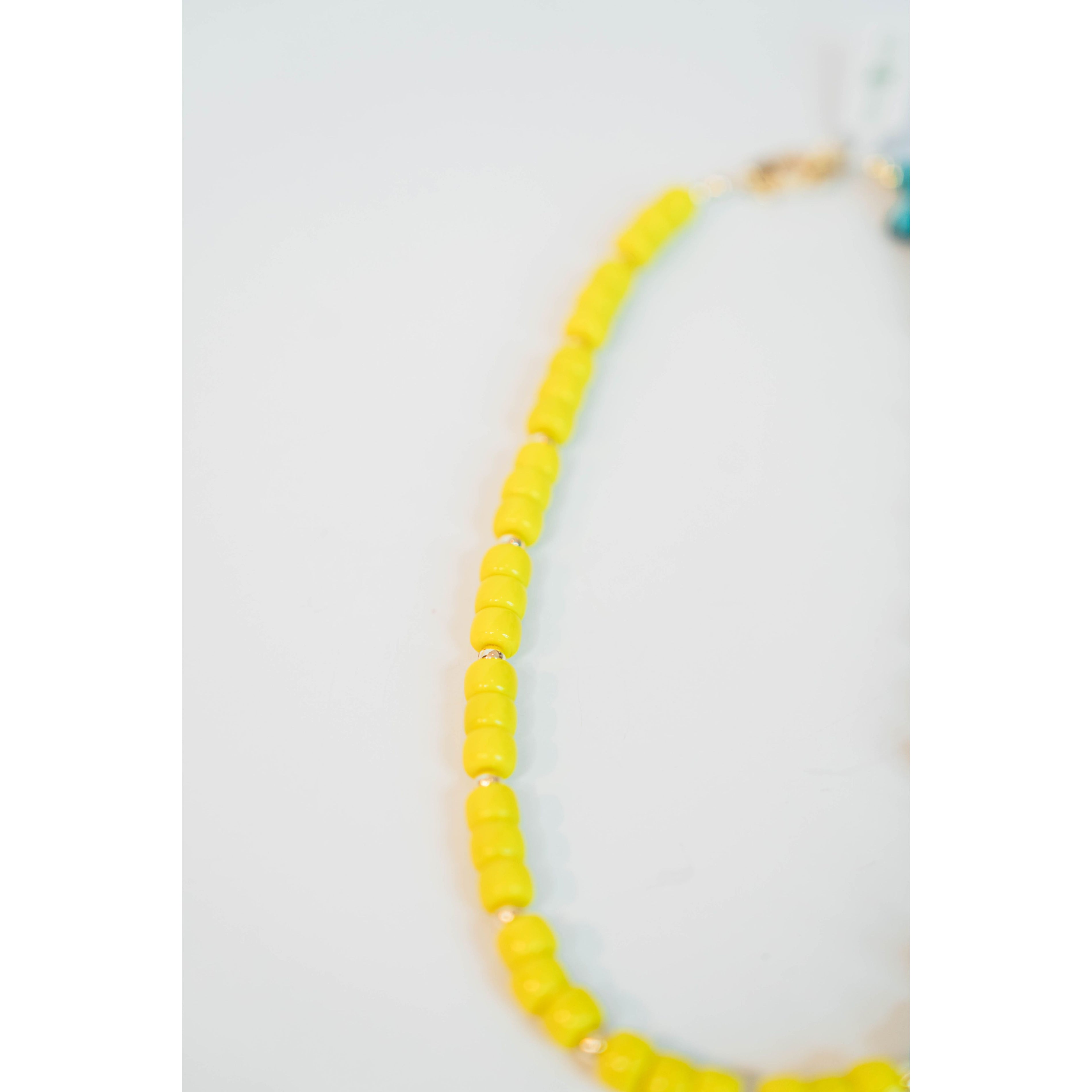 neon yellow beaded necklace with gold spacers