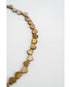 Necklace with heart-shaped beads on a white background