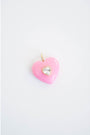 pink heart-shaped pendnat with a small diamond-like center accent on a light background