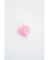 pink heart-shaped pendnat with a small diamond-like center accent on a light background