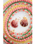 Shell-shaped earrings on a colorful beaded necklace with a white background