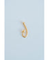 gold textured fishing hook charm on a light grey background