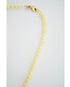 Necklace with yellow and gold beads on a light gray background